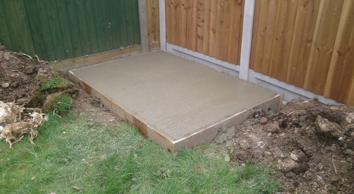 Concrete base and foundation work for garden building installation